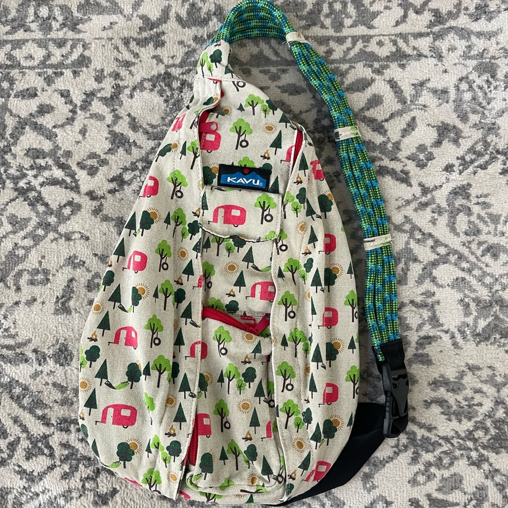 Kavu Sling bag. One Size. Campfire, trees, hammock, camper, sun pictures.